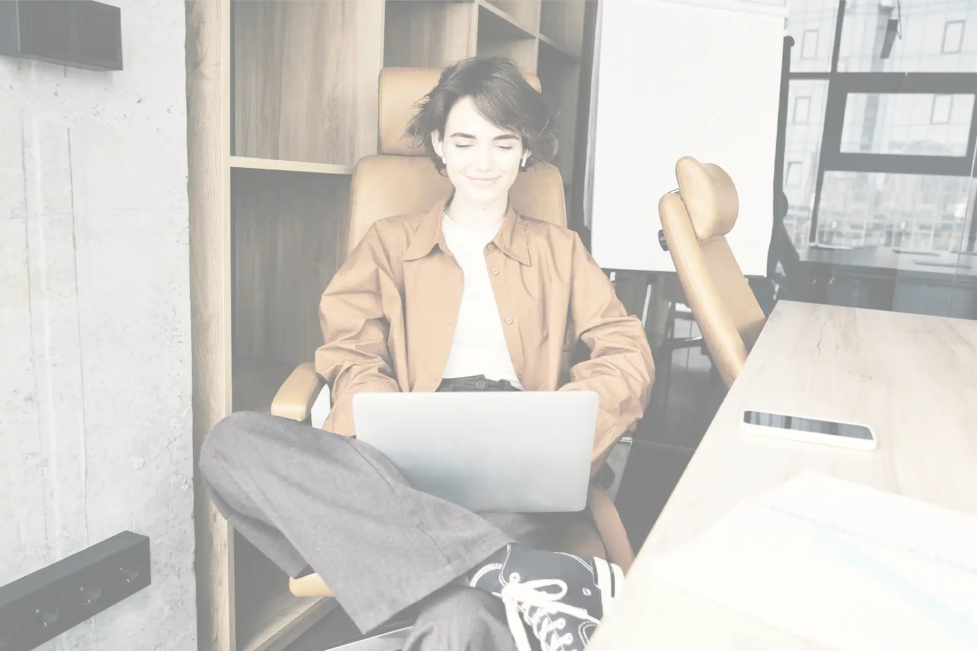 Self-employed borrower reviewing mortgage documents with loan officer in California