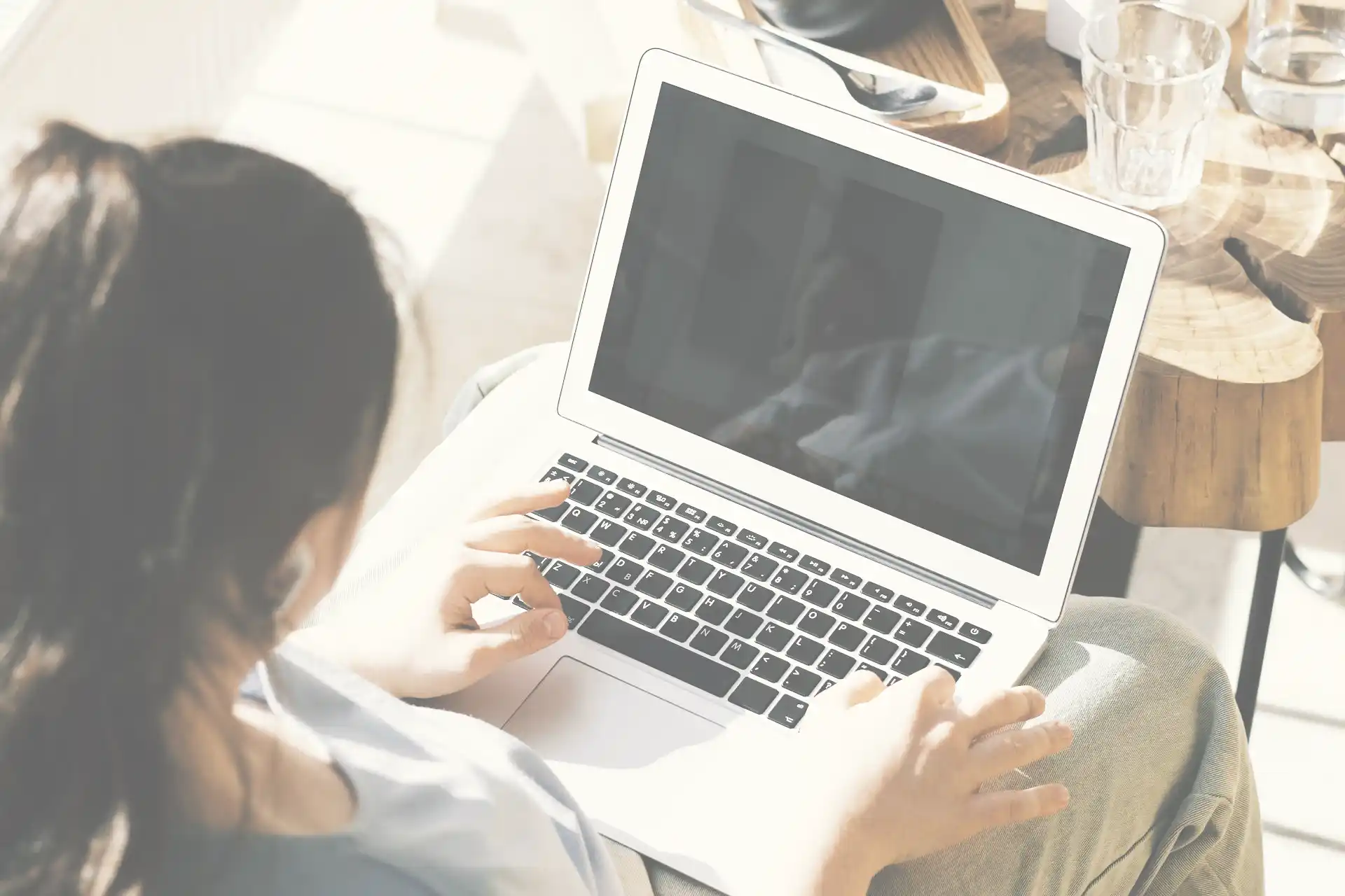 California homeowner checking HELOC rate online on laptop with no credit impact